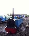 Wroxham Broad raises steam outside the engine shed at Aylsham (30/05/2003)