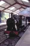 ‘The Bug’, visiting from the Romney line stands under the roof at Aylsham station   (05/08/1990)