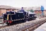 ‘River Esk’ backs onto its train at Aylsham, note the temporary air brake pipes and coupler   (01/09/1996)