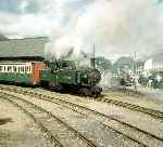 ‘Taliesin’ waits to leave Portmadoc Harbour station with a train to Tanybwlch.   (00/07/1960)