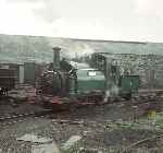 ‘Prince’ stands in the yard at Boston Lodge, behind is the now demolished Long Shed.   (00/07/1960)