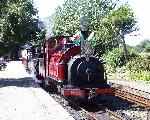 ‘Prince’ and ‘Linda’ depart from Minffordd with their up train.   (03/08/2003)