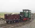 ‘Moelwyn’ shunts Palmerston's tender (full of bits off the loco) in Boston Lodge yard.   (07/08/2003)