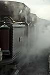 Single and Double Fairlie simmer in the yard at Boston Lodge.       (01/05/2005)