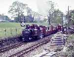 ‘Merddin Emrys’ runs past Minffordd Yard with an up train   (02/05/1993)