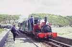 ‘Velinheli’ trails along behind the Minffordd shuttle as it runs along the Cob   (02/05/1993)