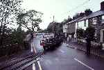 The tail end of the gravity slate train as it runs across Penrhyn crossing   (05/05/2003)