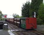 The vintage train departs for Porthmadog, a view of the trailing four wheelers. Minffordd   (04/05/2003)