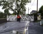 On Monday morning, Penrhyn crossing had acquired a total of 3 crossing keepers, leading to some indecision as to exactly when to close the gates!   (05/05/2003)