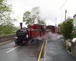 ‘David Lloyd George’ runs over the crossing at Penrhyn with the 10:20 ex-Porthmadog   (05/05/2003)