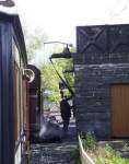 ‘Taliesin’ takes water at Tanybwlch, viewed from the vintage train behind   (05/05/2003)