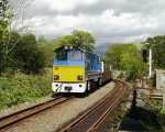 ‘Vale of Ffestiniog’ runs over the top end points at Minffordd with the 13:55 from Blaenau   (05/05/2003)