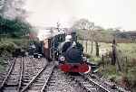 ‘Blanche’ emerges from the cutting into Dduallt station with the 1997 Gala's very early first train of the day   (05/05/1997)