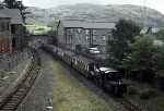 ‘Blanche’ emerges from under the Dorfil footbridge with a train departing from Blaenau Ffestiniog   (18/09/2000)