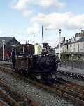 Taliesin runs through Harbour station with a Steam Railway Magazine headboard (28/09/2003)