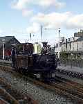 ‘Taliesin’ runs through Harbour station with a ‘Steam Railway Magazine’ headboard   (28/09/2003)