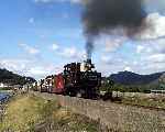 Taliesin pulls the Victorian train along the Cob on the way to Tanybwlch (28/09/2003)