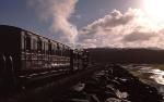 David Lloyd George heads into the morning sun with an up train along the Cob   (12/10/2002)