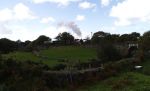 Palmerston crosses Gwyndy bank with a short 1920s vintage train   (12/10/2002)