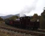 Palmerston simmers with a rake of goods wagons at Dduallt   (13/10/2002)