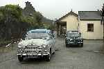 Classic vehicles were on display along the line all weekend, a typical 1950s pair spent the weekend at Penrhyn.   (25/09/2004)