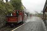 ‘Prince’ and the returning Flying Flea halt at Penrhyn in a cloud of steam.   (25/09/2004)