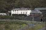 The Simplex returns from Minffordd with 10 & 20, passing Boston Lodge.   (25/09/2004)