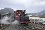 ‘Prince’ pulls carriages 23 & 12 along the main line by chain, re-enacting the daily 1955 season manoeuvre.    (26/09/2004)