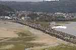 From high above Boston Lodge, ‘David Lloyd George’ is seen crossing the Cob light engine.   (26/09/2004)