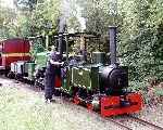 ‘Rishra’ is tended to as she waits with ‘Peter Pan’ to pass a down train at Leedon loop   (07/09/2003)