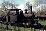 A rather unkempt 2 foot gauge ex War Department Hudswell Clarke 0-6-0T awaits restoration.   (04/04/1994)