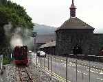 Elidir passes the quarry workshops at Gilfach Ddu with a train approaching from the new extension. (06/08/2003)