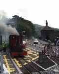 Elidir approaches the level crossing at Gilfach Ddu station, arriving off the new extension. (06/08/2003)