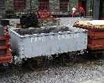 An iron-sided wagon from the Parc & Croesor quarries, once regularly used on the Croesor Tramway and lower section of the Welsh Highland Railway.   (06/08/2003)