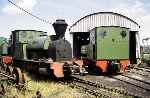 0-4-2ST ‘Premier’ with 0-6-2T ‘Superb’ outside the rather fetching corrugated iron shed at Kemsley Down   (28/07/1996)