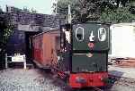 After arriving with it's last working of the day, ‘Douglas’ propels a rake of carriages up the hill from Tywyn Wharf   (01/08/1981)