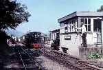 ‘Douglas’ about to exchange tokens on a down train, ‘Sir Haydn’ & ‘Merseysider’ also in shot   (02/08/1981)