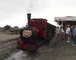 Next stop Bournemouth? ‘Duncan’ appears to be a little lost in charge of the Pines Express at Tywyn Wharf   (29/07/2001)