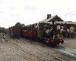 ‘Dolgoch’ bedecked with flags and headboard with the ‘Golden Jubilee’ departure at Tywyn Wharf   (29/07/2001)