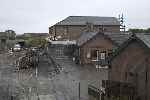 The classic view of Wharf from Brynhyfryd Road has changed forever with the construction of the new buildings.   (27/09/2004)