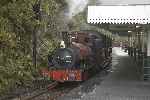 ‘Sir Haydn’ runs in to Abergynolwyn with an up train, looking rather fetching in it's Corris Railway livery.   (27/09/2004)