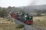 The mixed train approaches the road bridge at Bettws Garmon after crossing the river.   (11/09/2004)