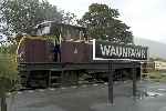 ‘Caernarfon Castle’ stands at the south end of Waunfawr, trailing behind the mixed train.   (11/09/2004)