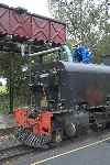 Garratt 143’s tank is replenished at Waunfawr.   (11/09/2004)