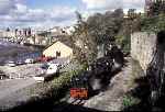 138 departs for Dinas, the castle towers beyond   (13/10/1997)