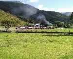 143 climbs through the fields as it heads towards Snowdon Ranger   (28/09/2003)