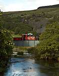 A brief glimpse of ‘Prince’ crossing the Afon Gwyrfai at Bettws Garmon.       (16/09/2005)