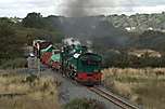 138 runs towards the bridge at Bettws Garmon with an up mixed train.       (17/09/2005)