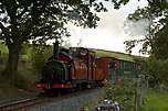 ‘Prince’ runs round the curves near Tan-yr-allt between Tryfan Junction and Waunfawr with a vintage train.       (17/09/2005)
